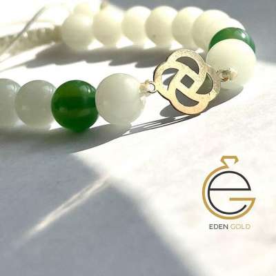 دستبند طرح گل گرد شده طلا ۱۸ عیار